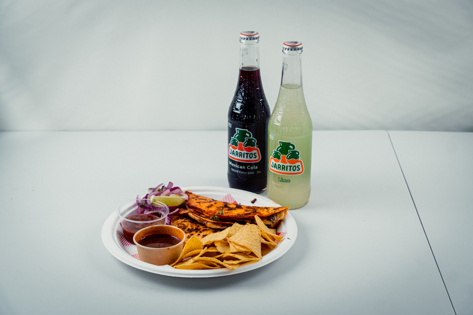 Birria taco dipped in consomme